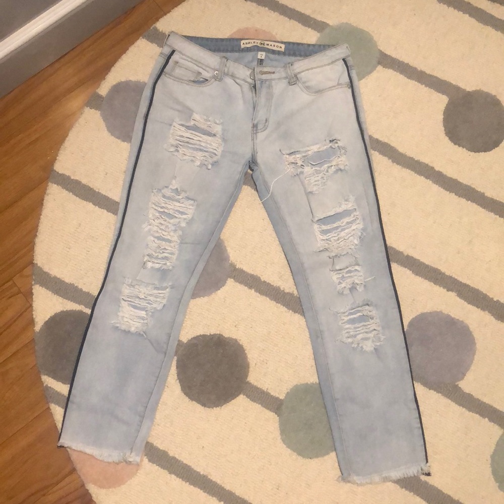 Distressed light wash jeans